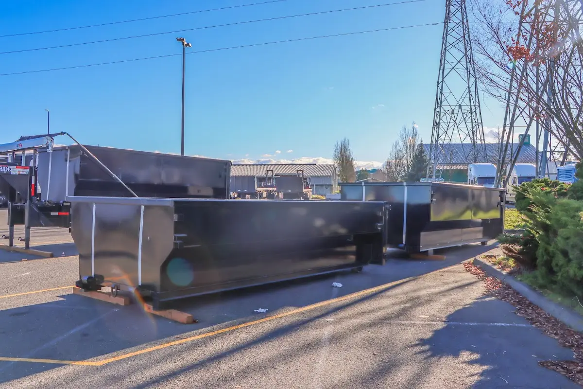 Roll-off dumpster ready for waste disposal at job site for 2 Yard Dumpster Rental in Golden Hills